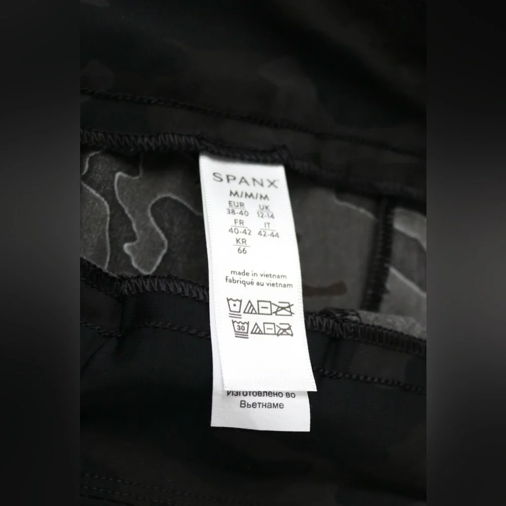 NWT- Spanx shorts in a black camo print. Size medium - Picture 2 of 5
